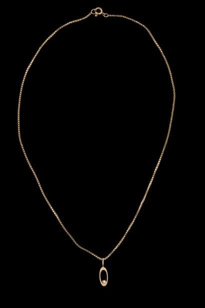 Venetian chain featuring a small vintage...