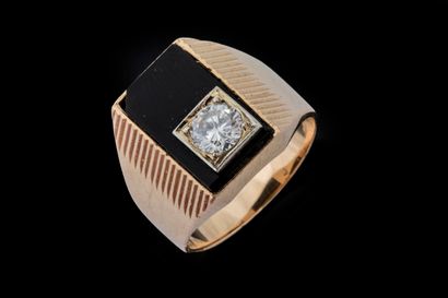 Rectangular signet ring set with an onyx...