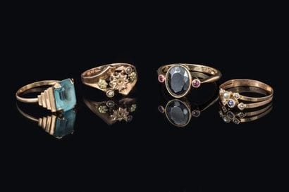 Set of 4 yellow gold rings (750) adorned...