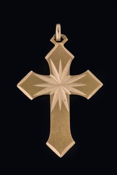 Satin-finished cross pendant featuring a...