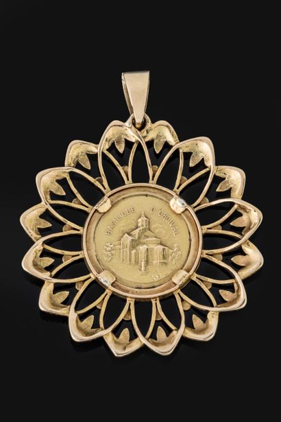Large pendant featuring a medallion of Notre...