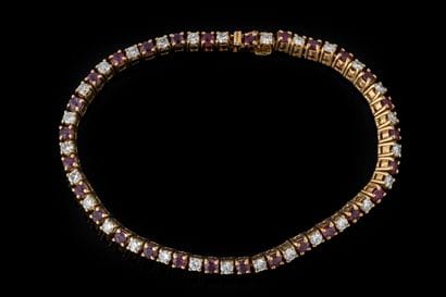 Yellow gold (750) river or tennis bracelet...