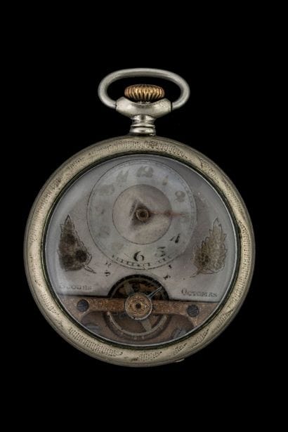 Octomas 8-day silver pocket watch. The back...