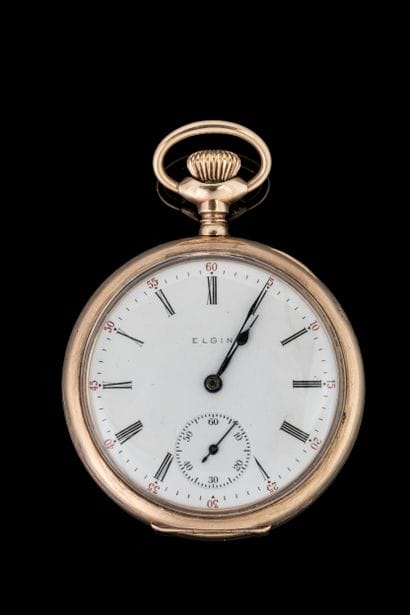 ELGIN. 385-millièmes/9k pocket watch. 
Weight:...