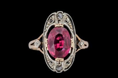 Marquise ring set with a red imitation stone...