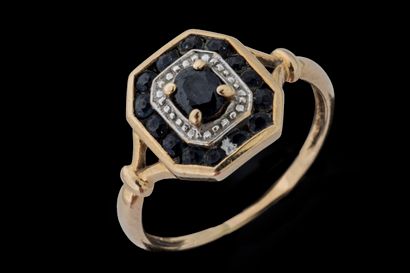 Small, curved rectangular ring in yellow...