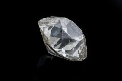 An antique-cut diamond (cushion square shape)...