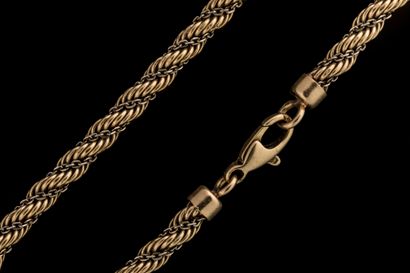 Twisted bracelet adorned with a yellow and...
