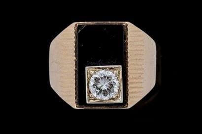 Rectangular signet ring set with an onyx...