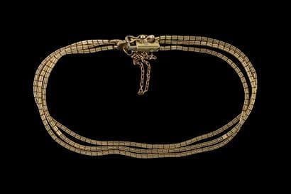Three-strand bracelet with brick-shaped links...
