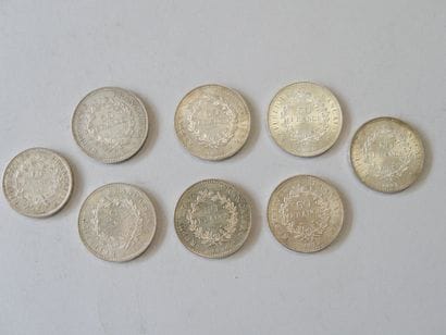 7 pièces en argent de 50 francs et 1 pièce...