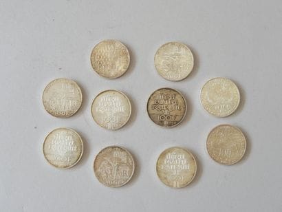 10 pièces de 100 francs en argent 
Poids...