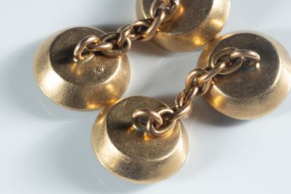 Paire de boutons manchettes ronds et concaves...