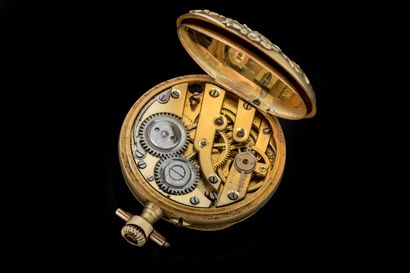 Small pocket or lapel watch with a yellow...