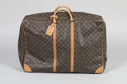 LOUIS VUITTON
Valise Sirius 70 en toile monogram,...