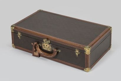 LOUIS VUITTON 
Valise de voyage rigide en...
