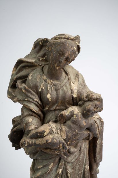 Virgin and Child, carved from wood with a...