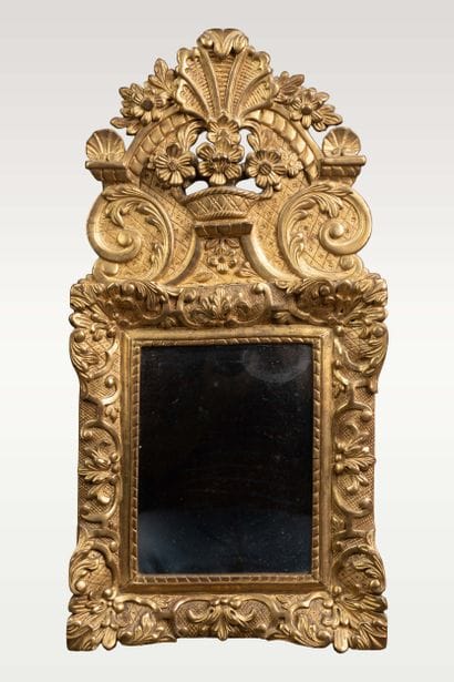 Wall-mounted mirror with a molded, carved,...
