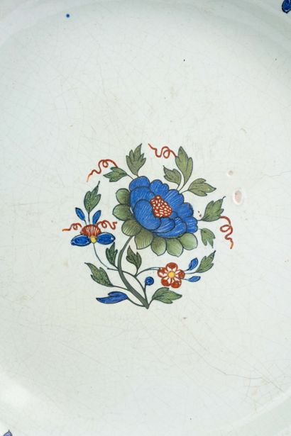 Large earthenware dish with a scalloped edge...
