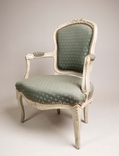 Armchair with a cabriolet back made of molded,...