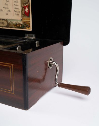 Rectangular wooden music box decorated with...