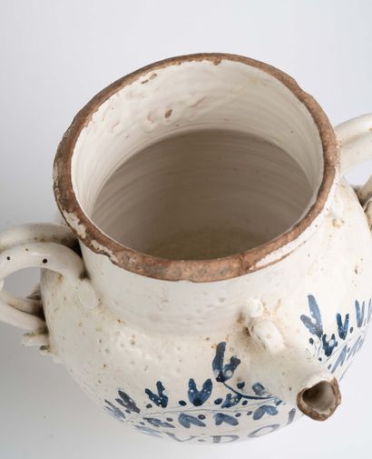 Large cream-colored earthenware goat with...