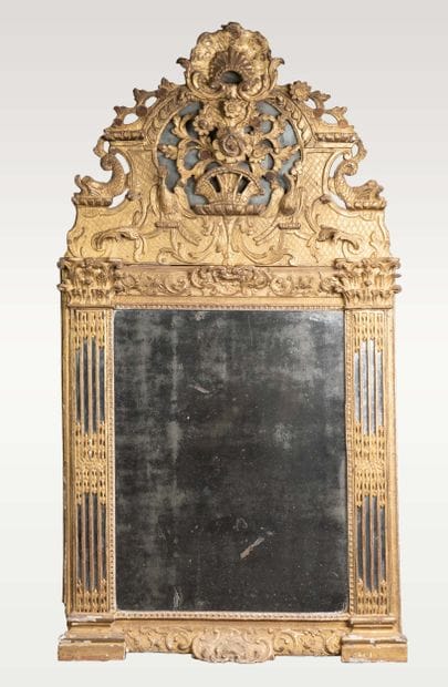 Mirror with glazing beads and a molded, carved,...