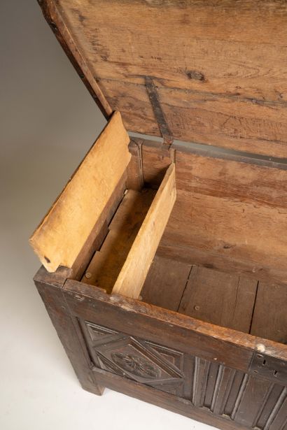Molded and carved oak chest, decorated with...