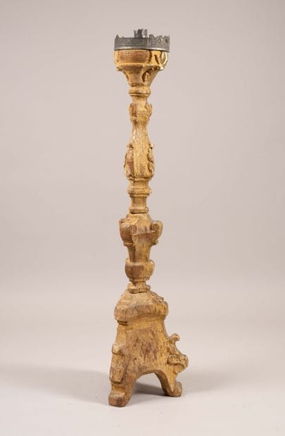 A baluster-shaped candleholder made of molded,...