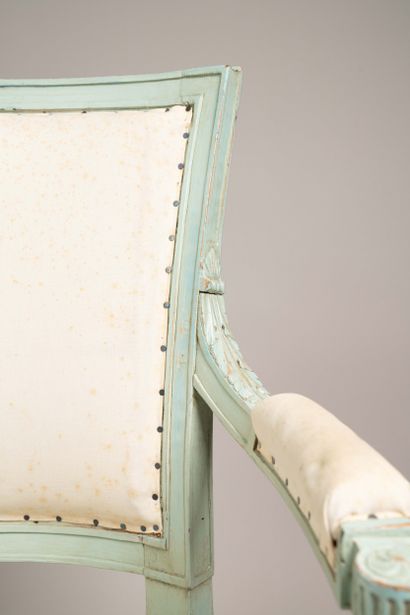 Armchair with a cabriolet back made of molded...