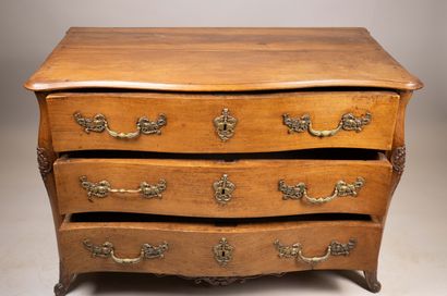 Chest of drawers with a richly decorated...