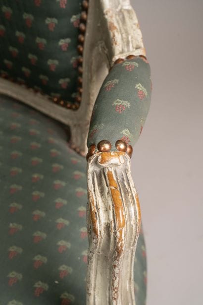 Armchair with a cabriolet back made of molded,...