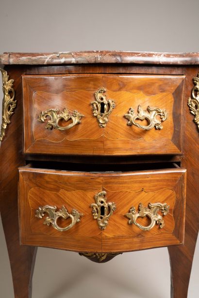 Curved “entre-deux” chest of drawers made...