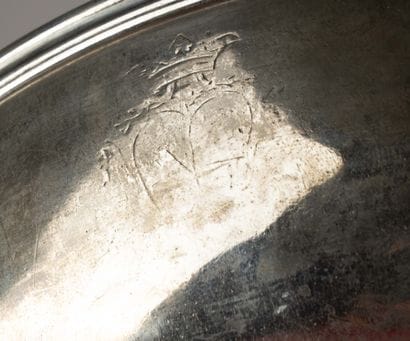 Silver utensil with a plain body and a laminated...