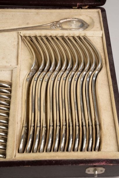 Solid silver cutlery set, featuring a twisted-wire...