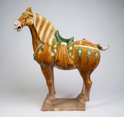 Pair of polychrome ceramic horse statues...