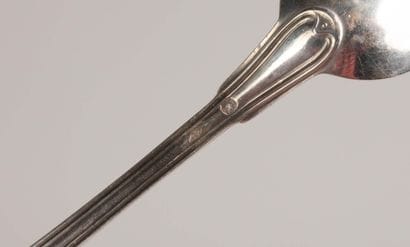 Set of 17 small silver spoons, marked with...