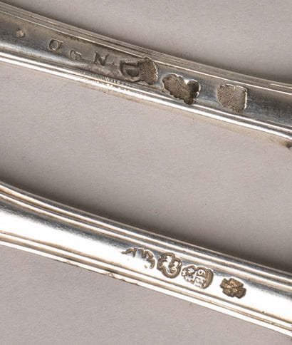 12 silver spoons and 15 silver forks from...