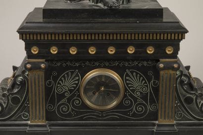 Patinated, gilded and engraved bronze clock...