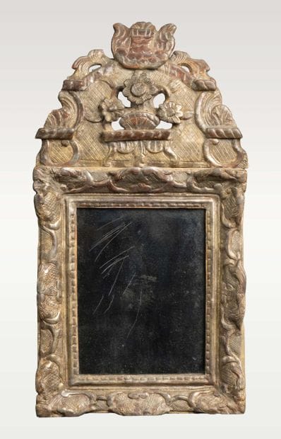 Wall-mounted mirror with a molded, carved,...