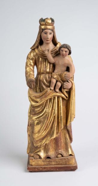 Carved, polychrome, and gilded wooden Virgin...