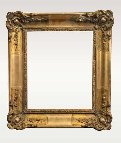 Pair of gilded wooden frames with floral...