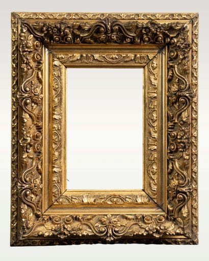 Wooden frame with gilded stucco and rich...