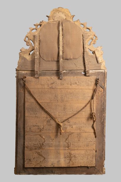 Mirror with glazing beads and a molded, carved,...