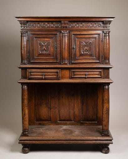 Molded and carved walnut sideboard, decorated...