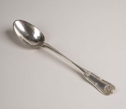 Silver stew spoon, with decorative ridges....