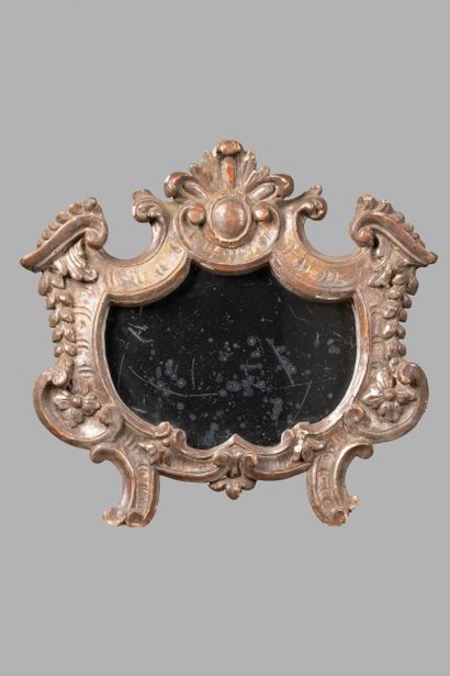 Molded, carved, and gilded wooden mirror,...
