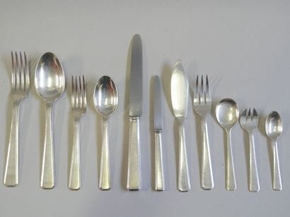 A large white metal dinner set, a 1950s model...