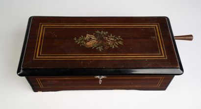 Rectangular wooden music box decorated with...