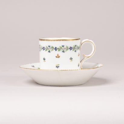 Porcelain cup and saucer with a cornflower...
